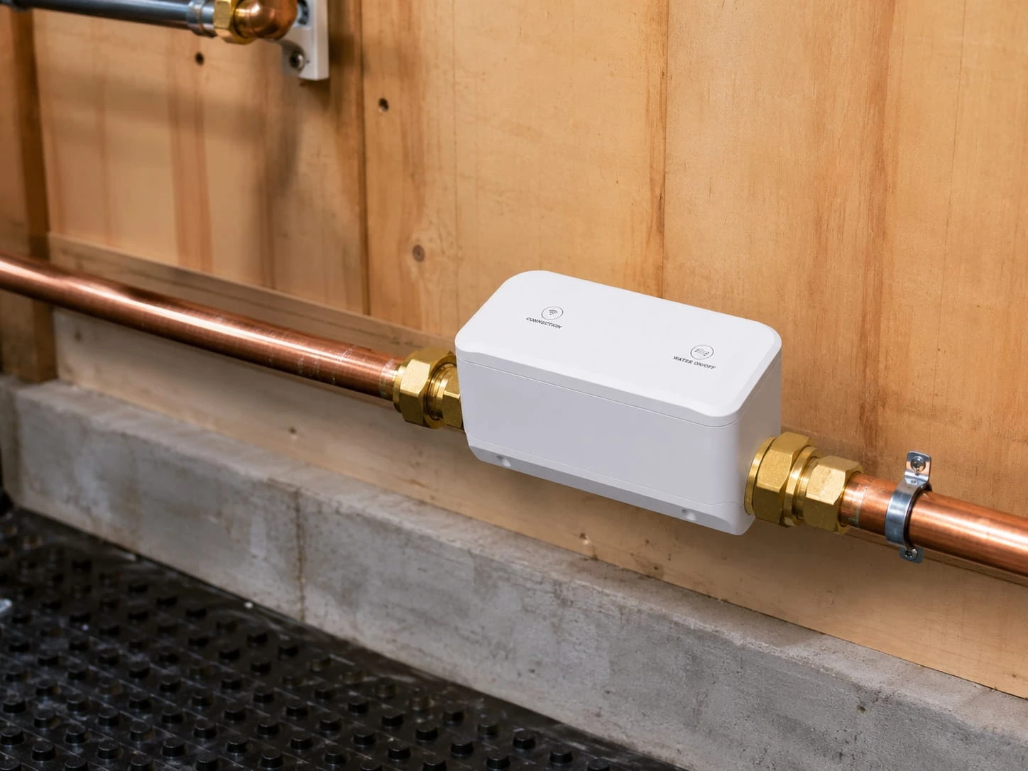 AquaNet-VM smart water valve mounted on a copper pipe in an indoor utility space