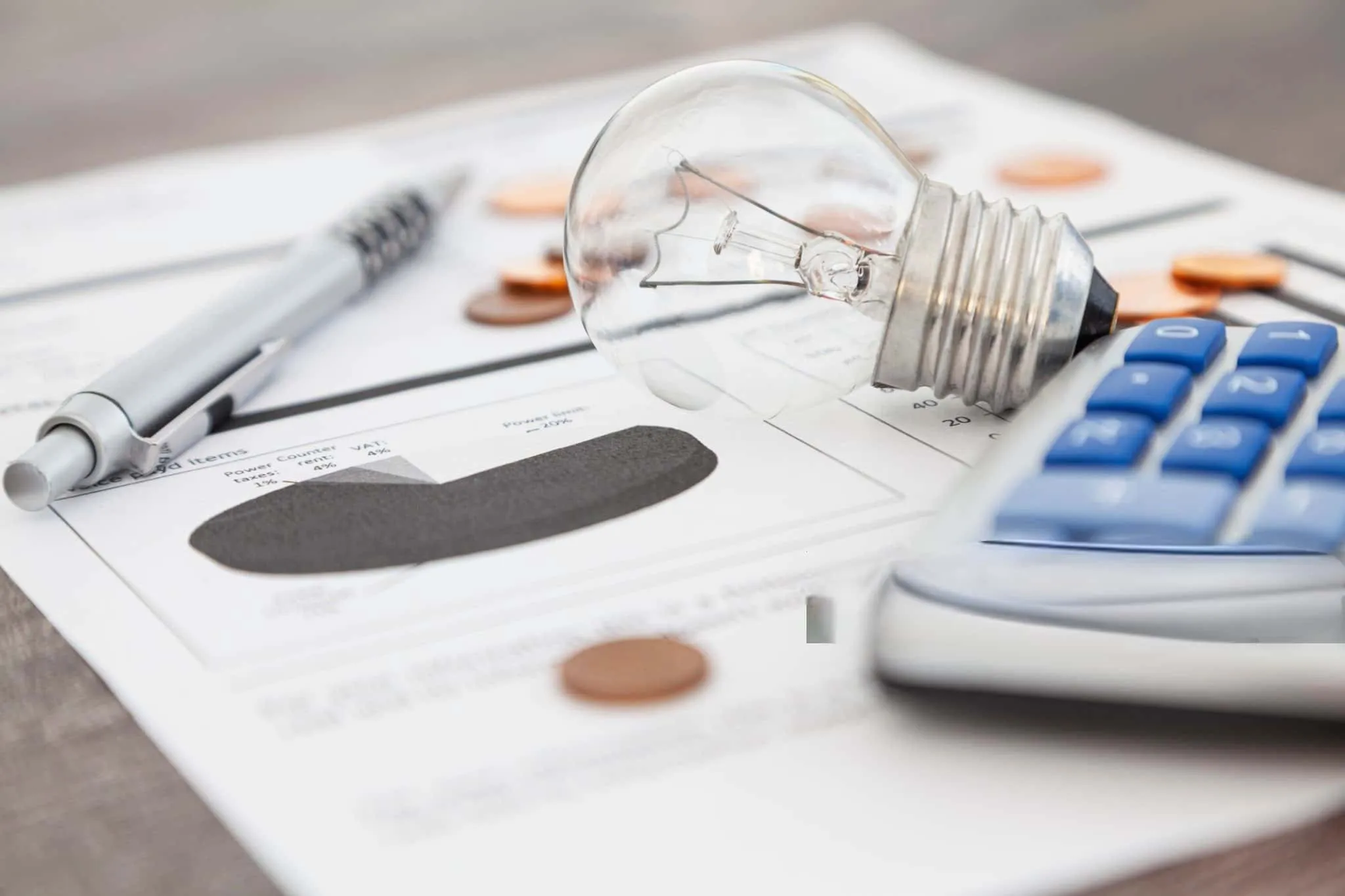Next to a household electricity bill is a calculator and a light bulb symbolizing the household electricity usage. Ask people use WiFi Home Energy Monitor to save they power