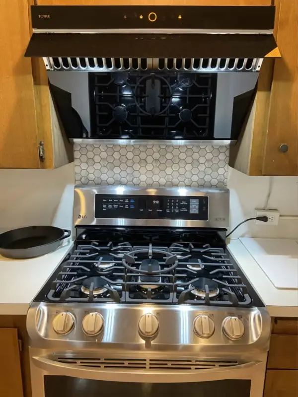 An American style family gas stove in use -