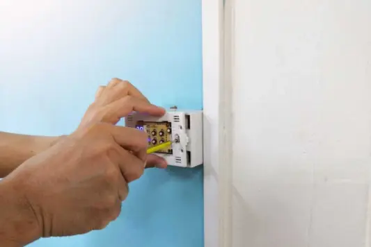 checking voltage for baseboard heater thermostat installation